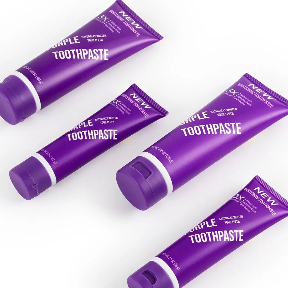 Purple whitening toothpaste tube for adults in 120g and 65g sizes for yellow stain removal.