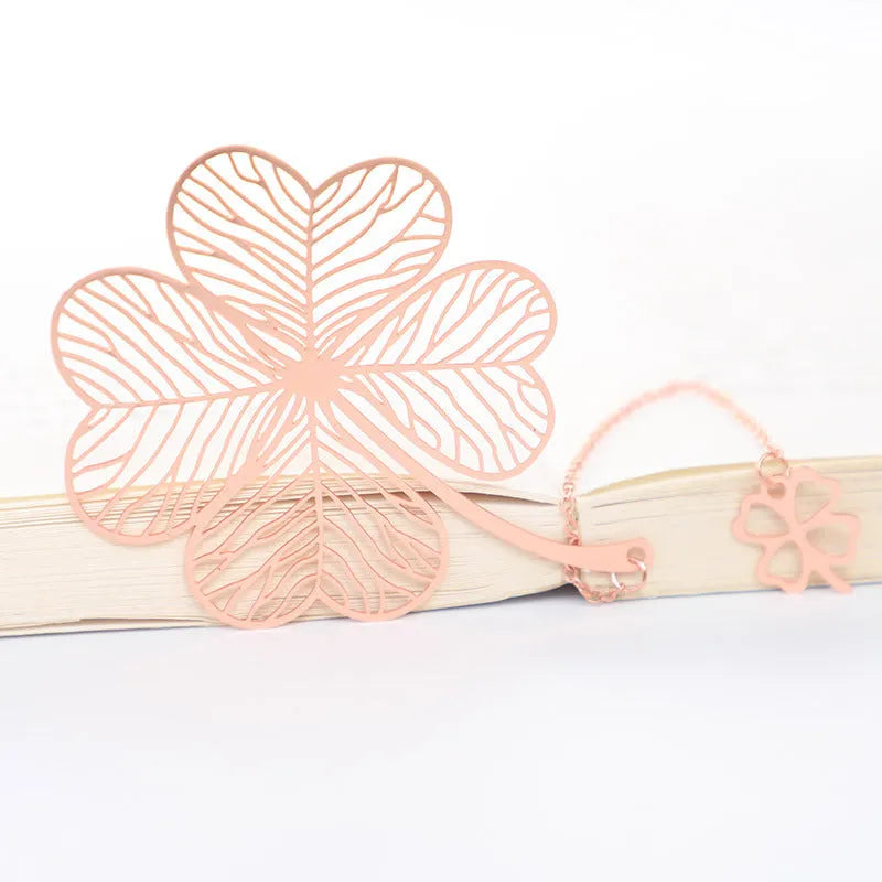 Brass metal bookmark with hollow plating decorative leaf pattern and rose gold tassel