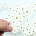 Miniature paper model of a toilet tissue roll for children's pretend play toys.