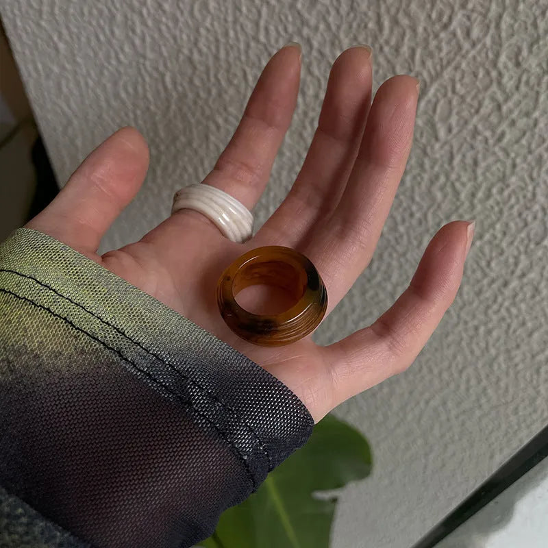 Resin ring with irregular wide band geometric design in Chinese retro style