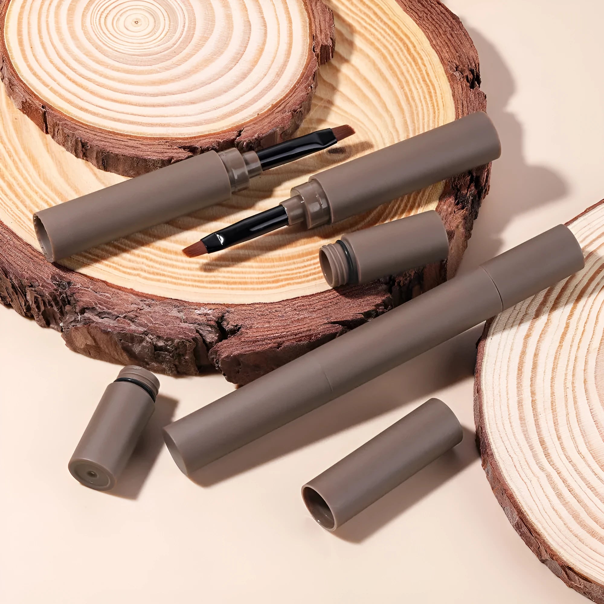 Double-headed eyebrow cream with pencil and powder ends in a choice of five natural colours.