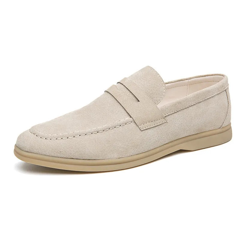 Men's beige slip-on leather casual shoes with a round toe and mid-height rubber sole.