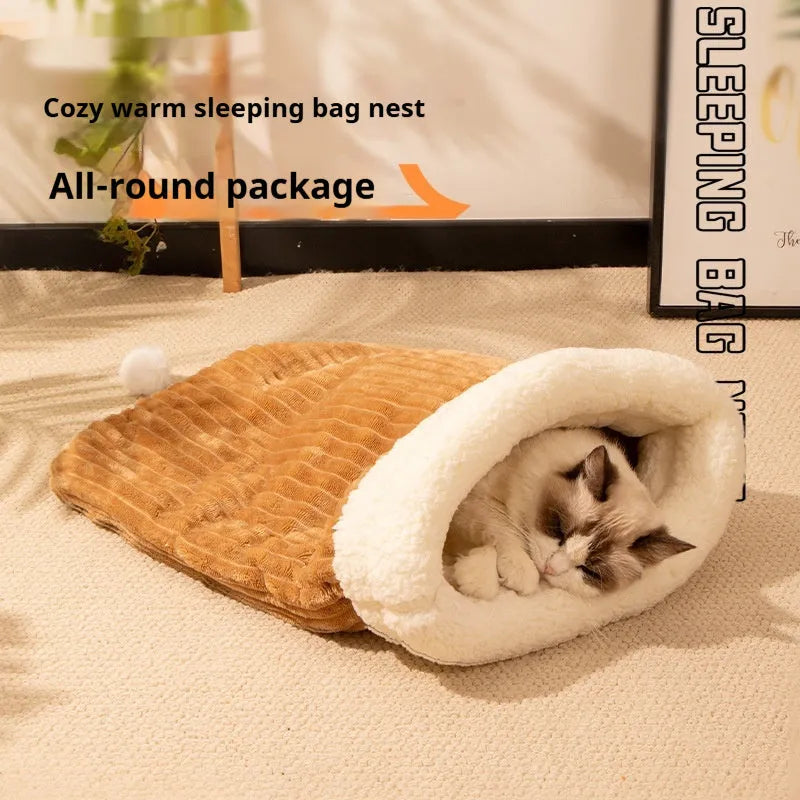 Flannel cat sleeping bag pet bed in pink Trojan pattern, 50cm by 40cm.