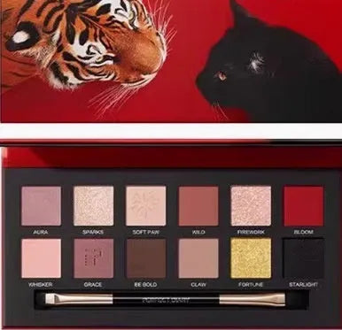 Explorer twelve-colour animal themed pressed powder eye shadow palette open to show shades