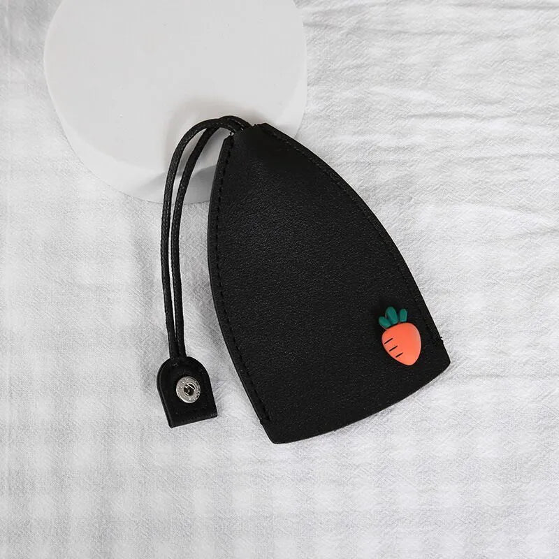 Cartoon pull-out key case in PU leather measuring 14 by 7.5 centimetres