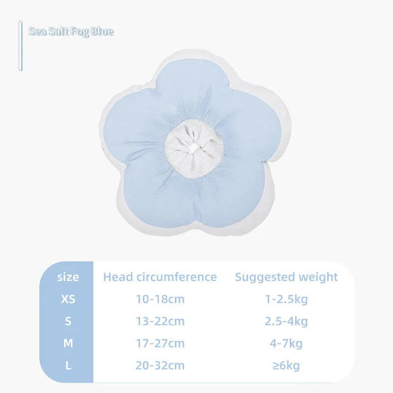 Cat wearing blue flower-pattern cotton recovery collar around neck