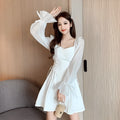 White chiffon patchwork waist-slimming maxi dress with long sleeves on mannequin