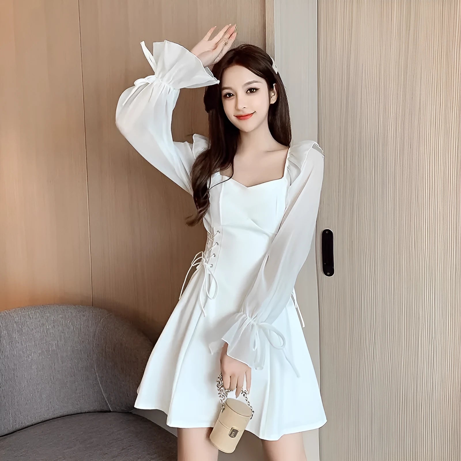 White chiffon patchwork waist-slimming maxi dress with long sleeves on mannequin