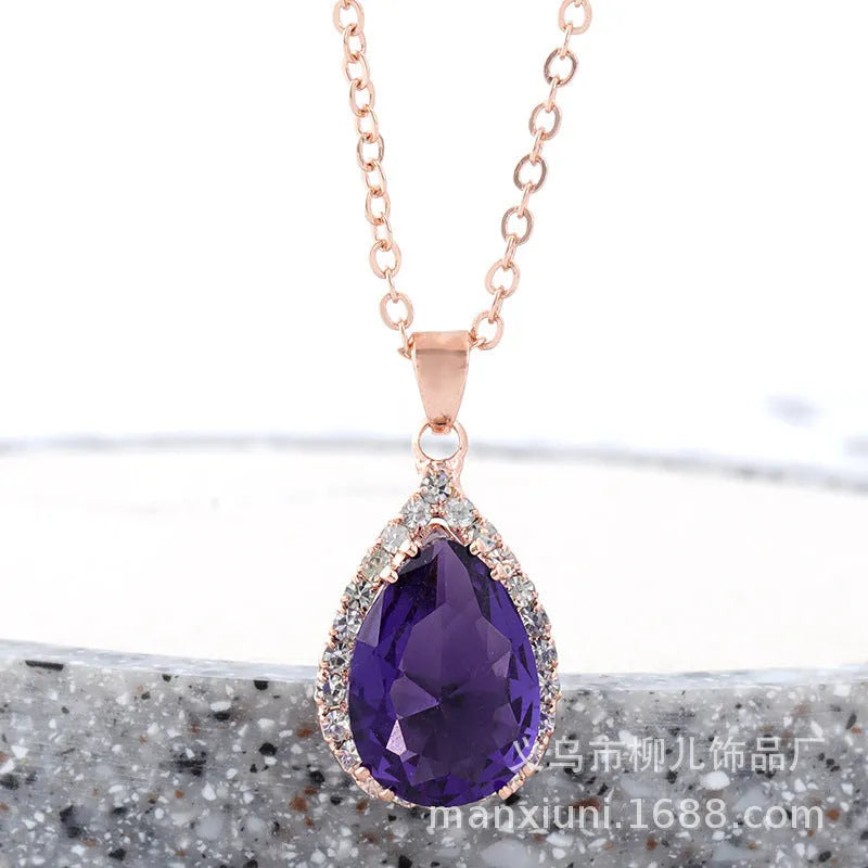 Pink rose gold drop shape rhinestone necklace with geometric design on alloy chain