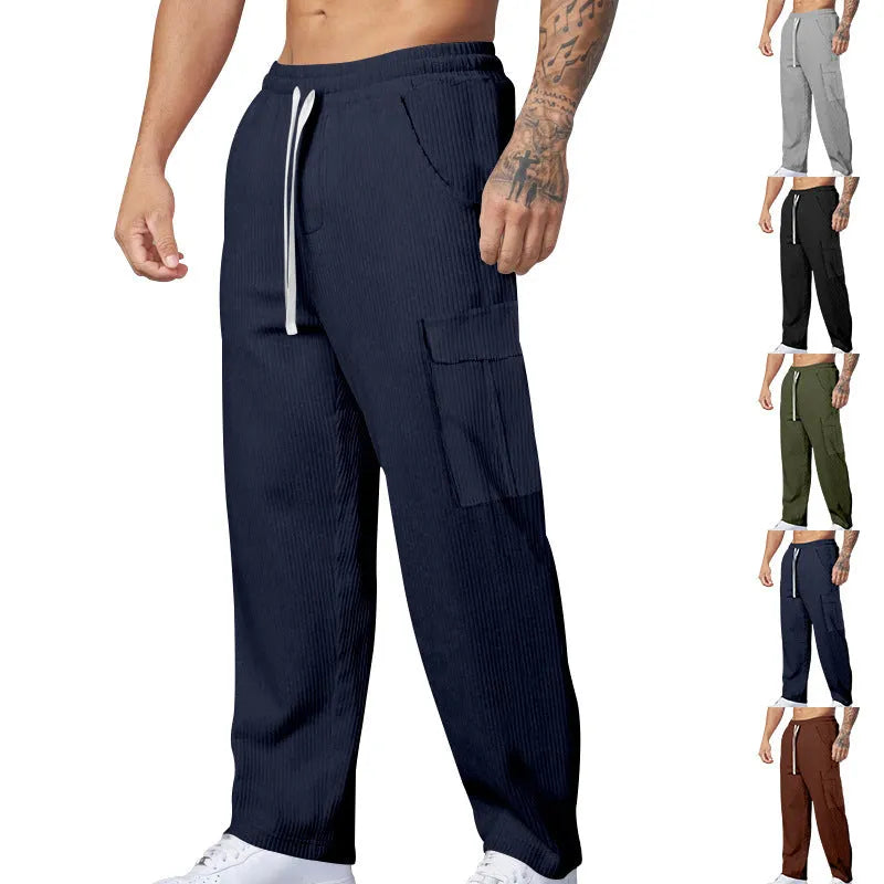 Men's straight-leg corduroy cargo trousers in a loose wide-leg fit with a drawstring waist.
