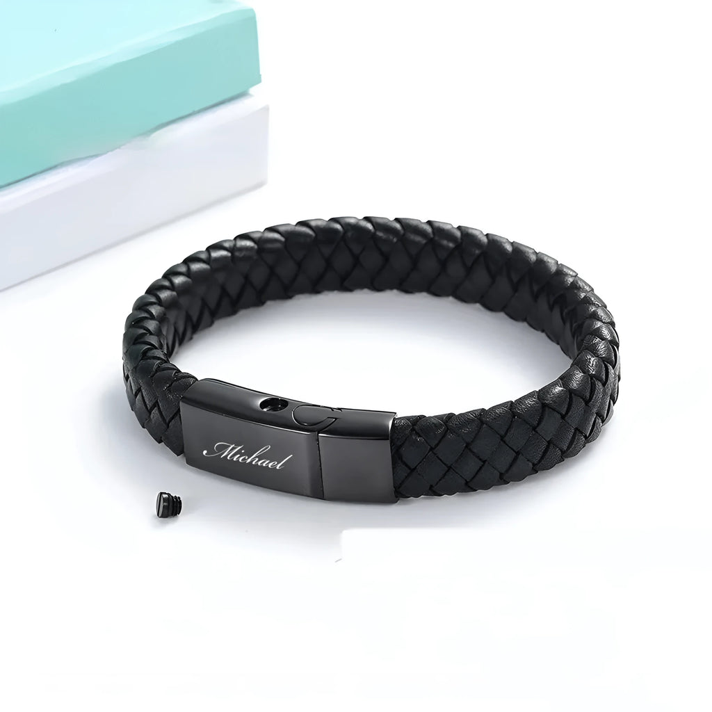 Black stainless steel and leather woven casket bracelet with English text, in a gift box.