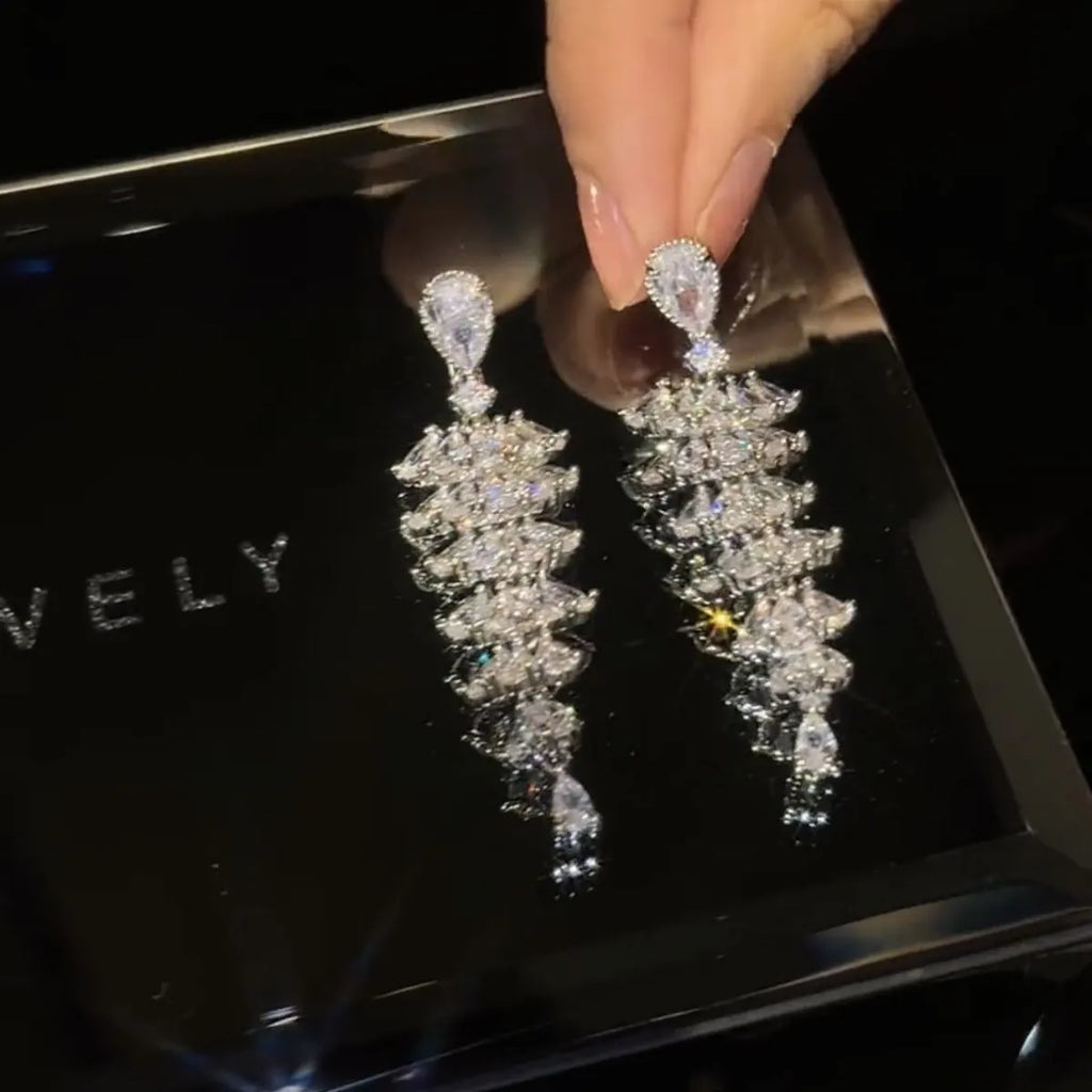 Silver Pagoda coloured Christmas tree and pagoda shaped drop earrings with zircon accents.