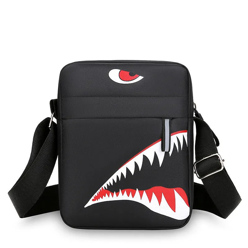 Men's black Oxford cloth crossbody bag with animal print pattern and shoulder strap.