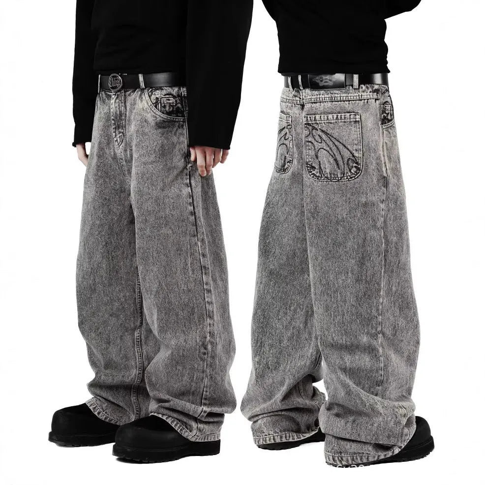 Grey loose fit straight-leg denim trousers for men and women on a mid waist