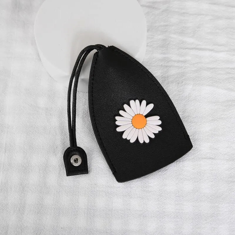 Cartoon pull-out key case in PU leather measuring 14 by 7.5 centimetres