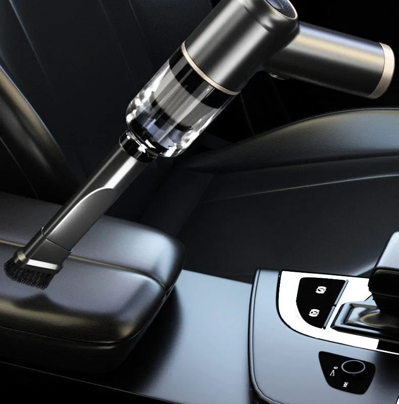 Black wireless handheld car vacuum cleaner with multiple brush and nozzle attachments