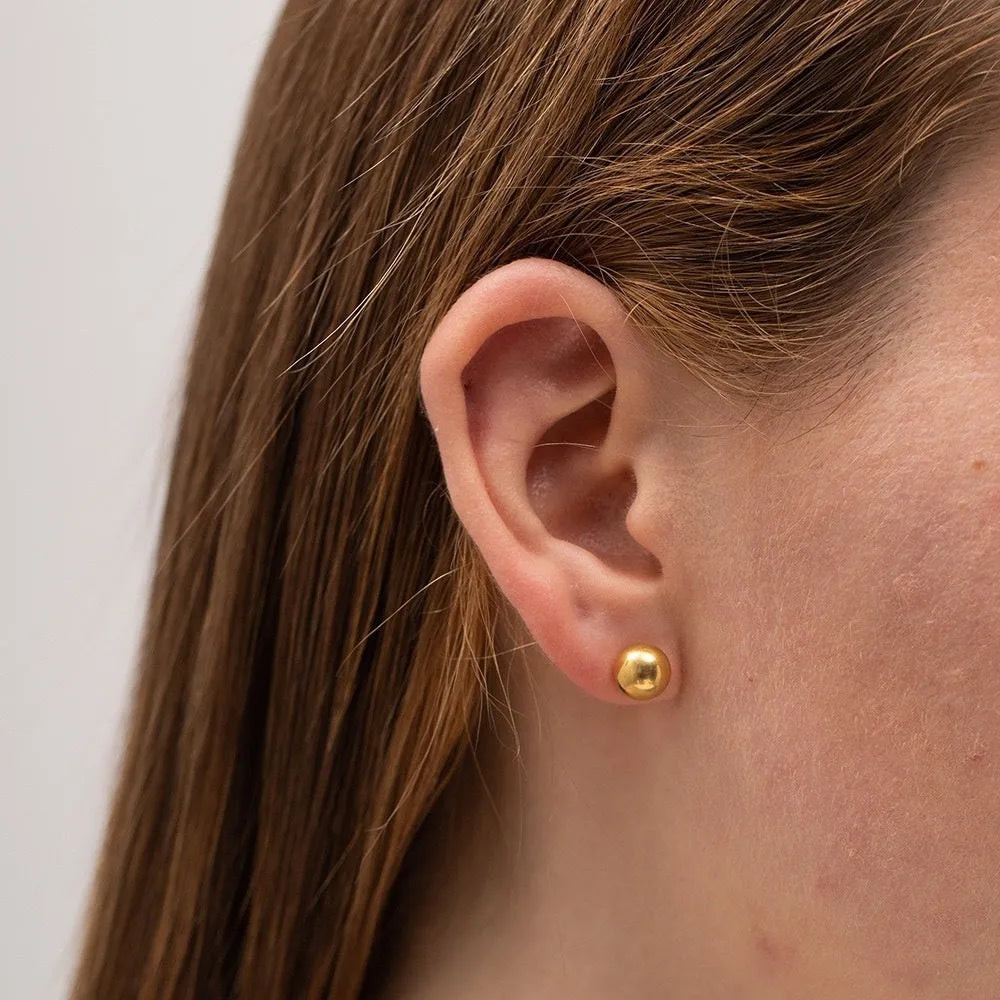 Stainless steel 18K gold-plated ball stud earrings in geometric round design