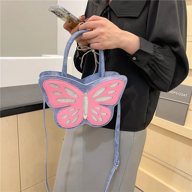 Small square white PU crossbody bag with contrast colour detailing on a model.