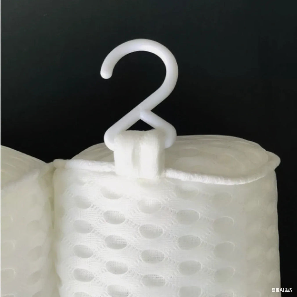 White bathtub pillow with suction cups on a 4D mesh cover.