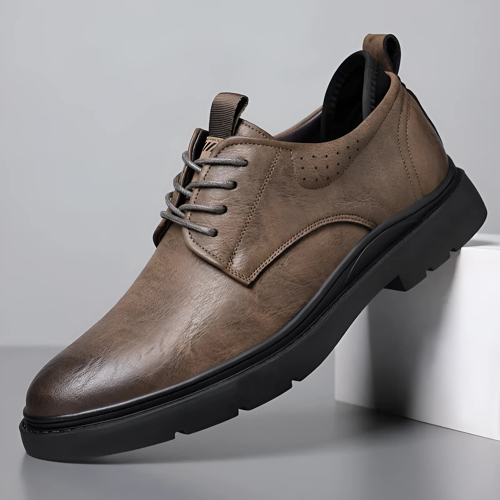 Men's black leather business sneakers with sewing line details on two-layer cowhide upper and rubber sole