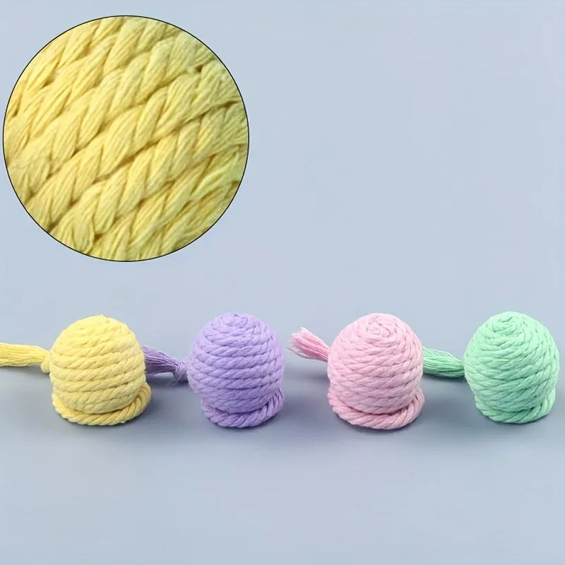 Cat toy ball with rope and built-in bell in multiple colours for kitten play