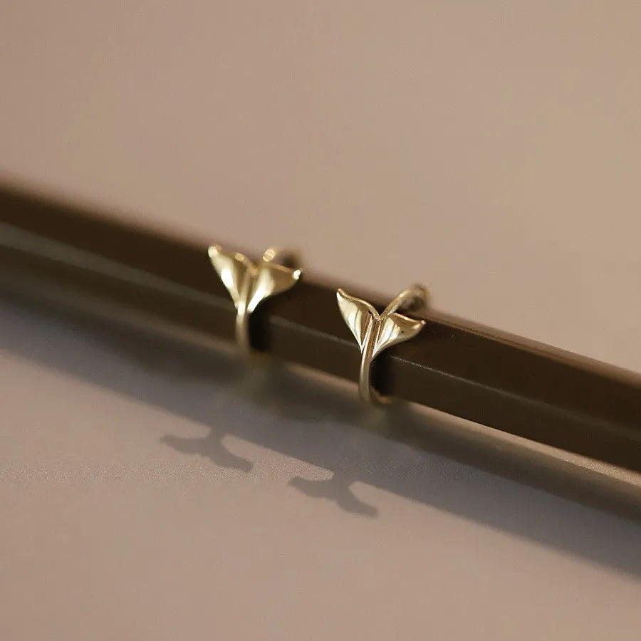 Gold and white gold fishtail hoop earrings made from 925 sterling silver