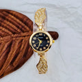 Women's stainless steel watch with round gold surface dial and vachette clasp