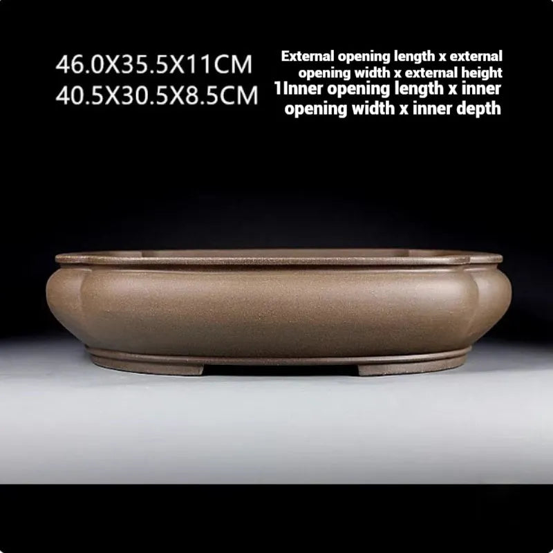 Handmade antique purple clay papaya-shaped flower pot shown from side displaying dimensions.
