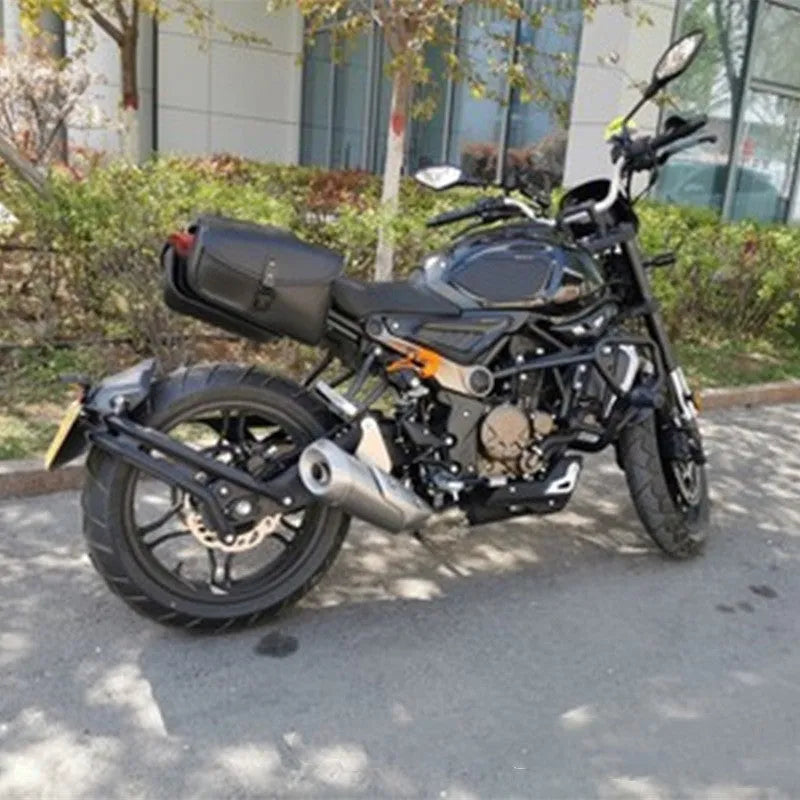 Black PU leather motorcycle swingarm bag mounted on Harley Sportster for tool storage