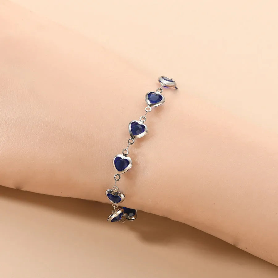 Geometric heart bracelet with colourful electroplated finish on stainless steel, unisex design