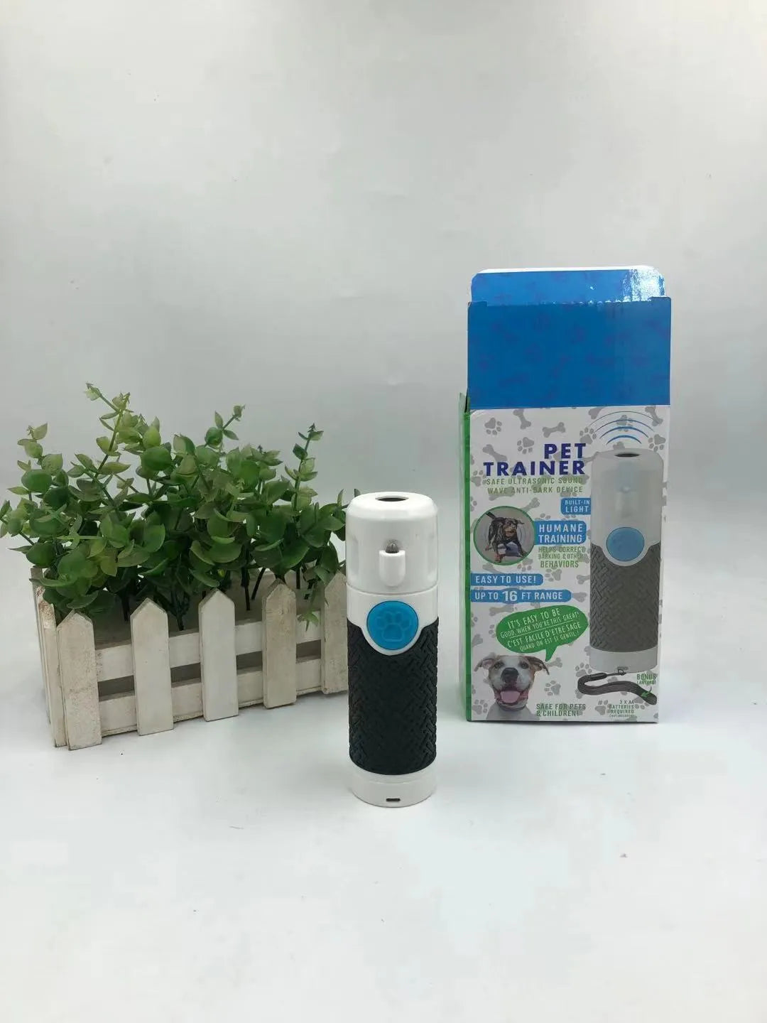 White ultrasonic dog bark stop trainer handheld device for behaviour control