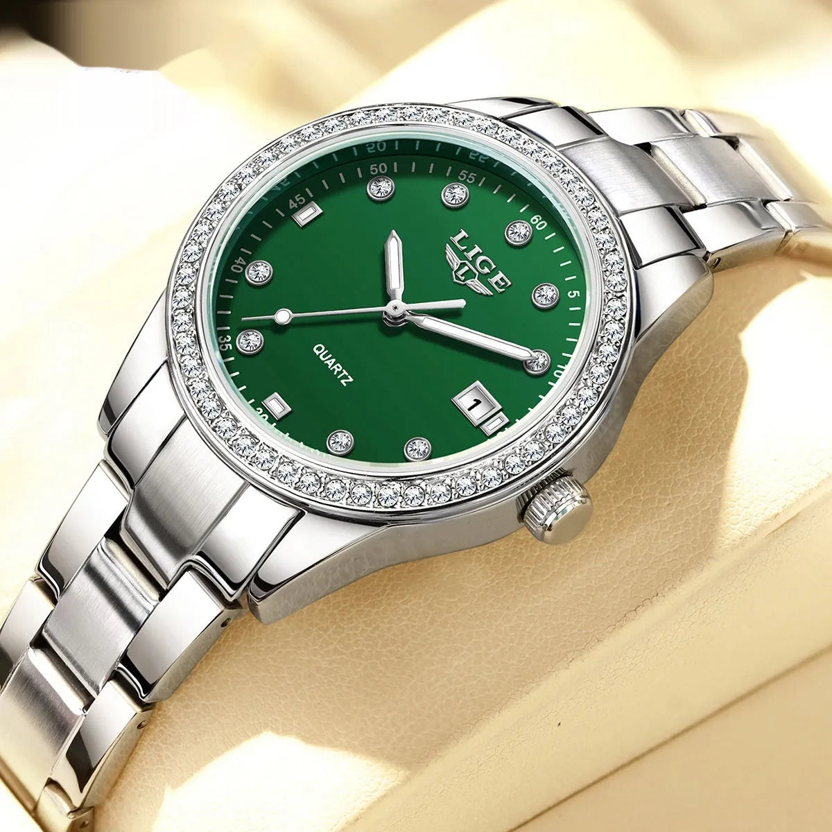 Women's silver fashion watch with diamond-encrusted bezel and luminous hands on 34mm stainless steel case
