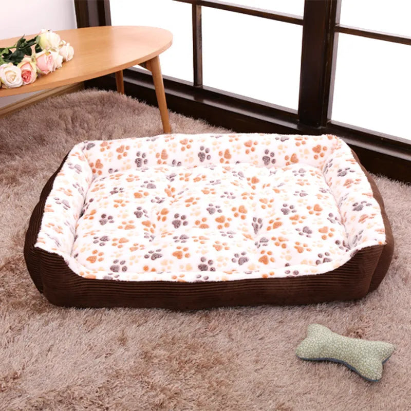 Beige plush sofa-style dog bed with raised sides for a small dog