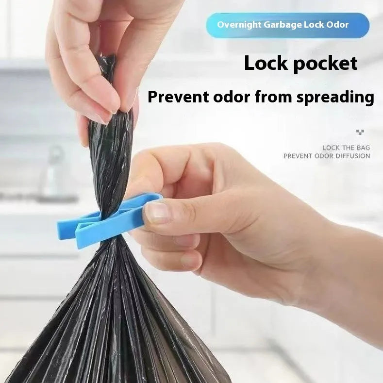 PP plastic non-slip clip for fixing a bin bag to the side of a trash can.