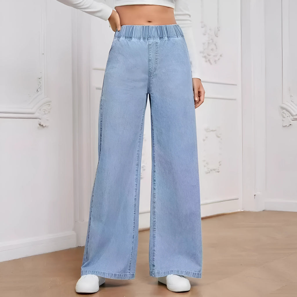 Light blue washed wide-leg denim trousers on hanger showing straight fit and mid-rise waist