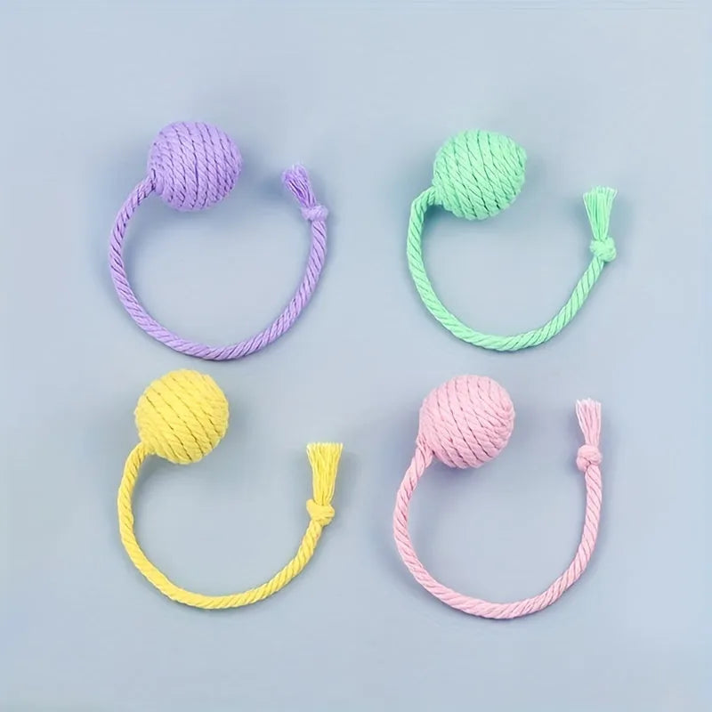 Cat toy ball with rope and built-in bell in multiple colours for kitten play