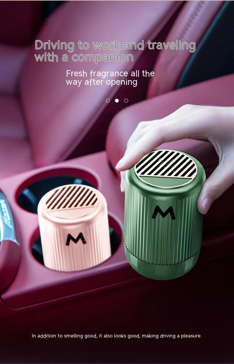 Solid car aromatherapy decoration cup measuring 10cm by 6cm available in four scent variations