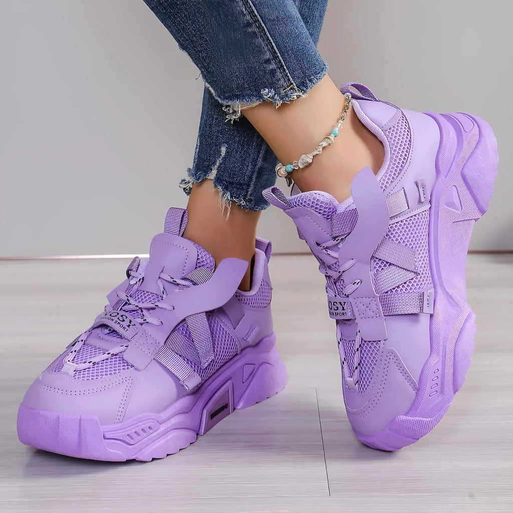 Women's purple platform mesh dad shoes with lace-up front and thick sole.