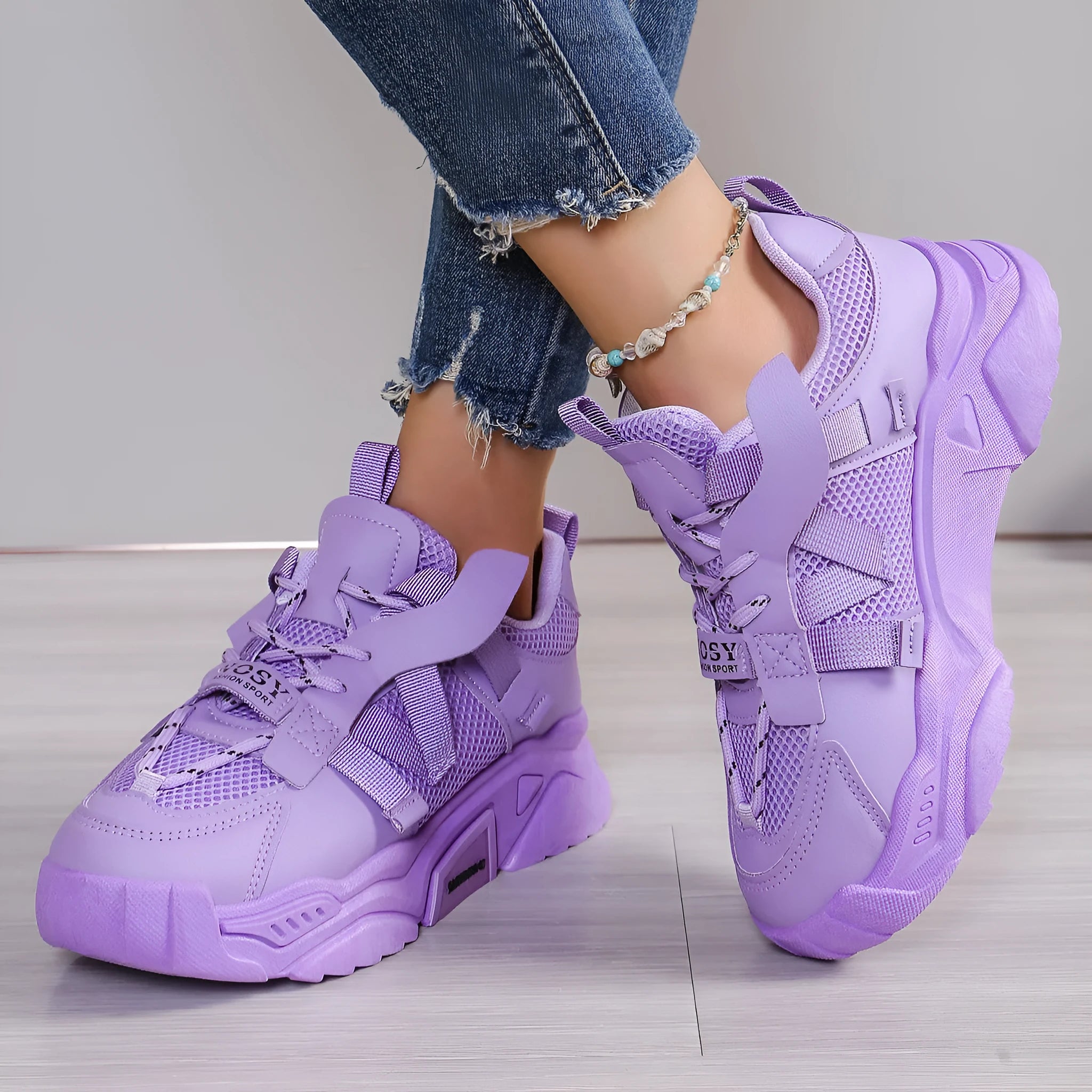 Women's purple platform mesh dad shoes with lace-up front and thick sole.