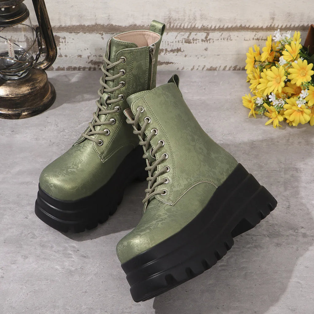 Women's white retro platform Martin boots with chunky heel and side zipper on a neutral background.