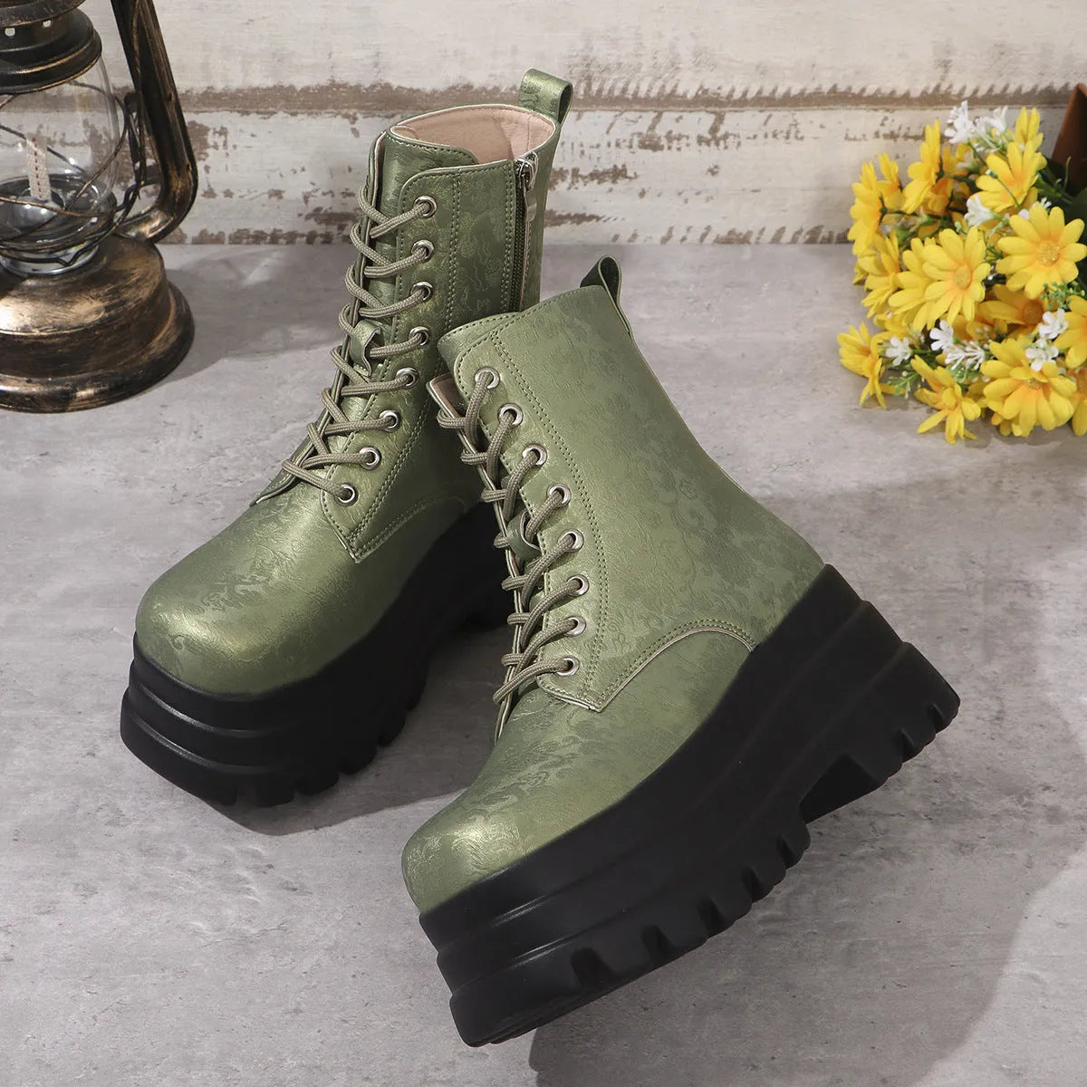 Women's white retro platform Martin boots with chunky heel and side zipper on a neutral background.
