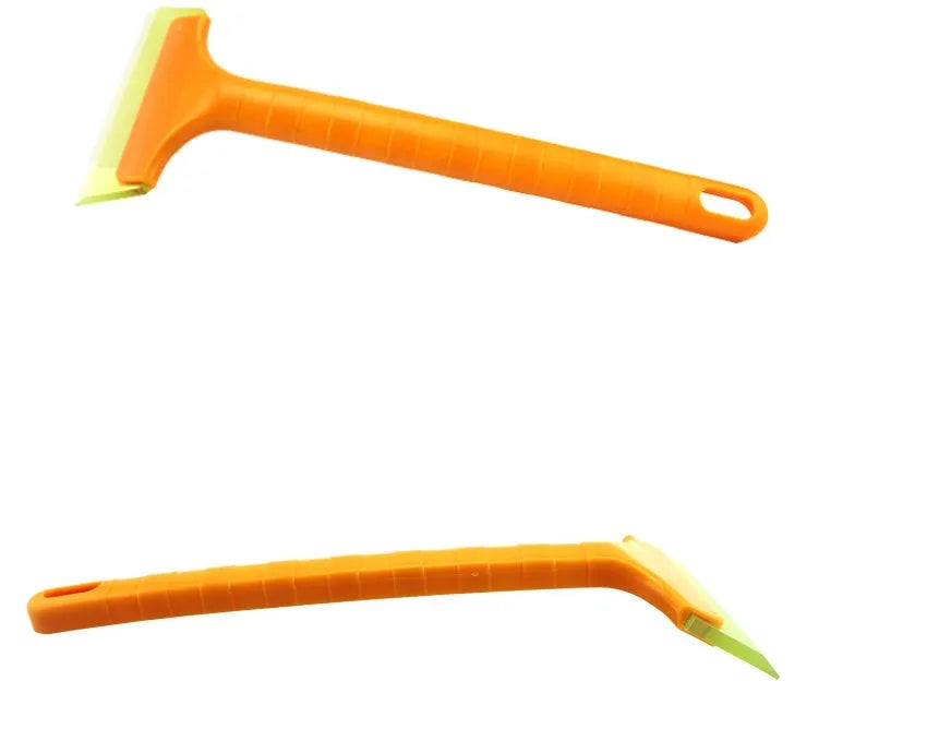 Yellow plastic car snow shovel for ice removal, 32cm length, on a dark background