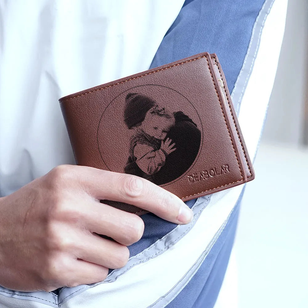 Men's brown leather wallet with a silver zip closure, shown closed and ready for gifting.