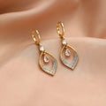 Gold and silver zircon water drop tassel earrings with copper electroplated construction