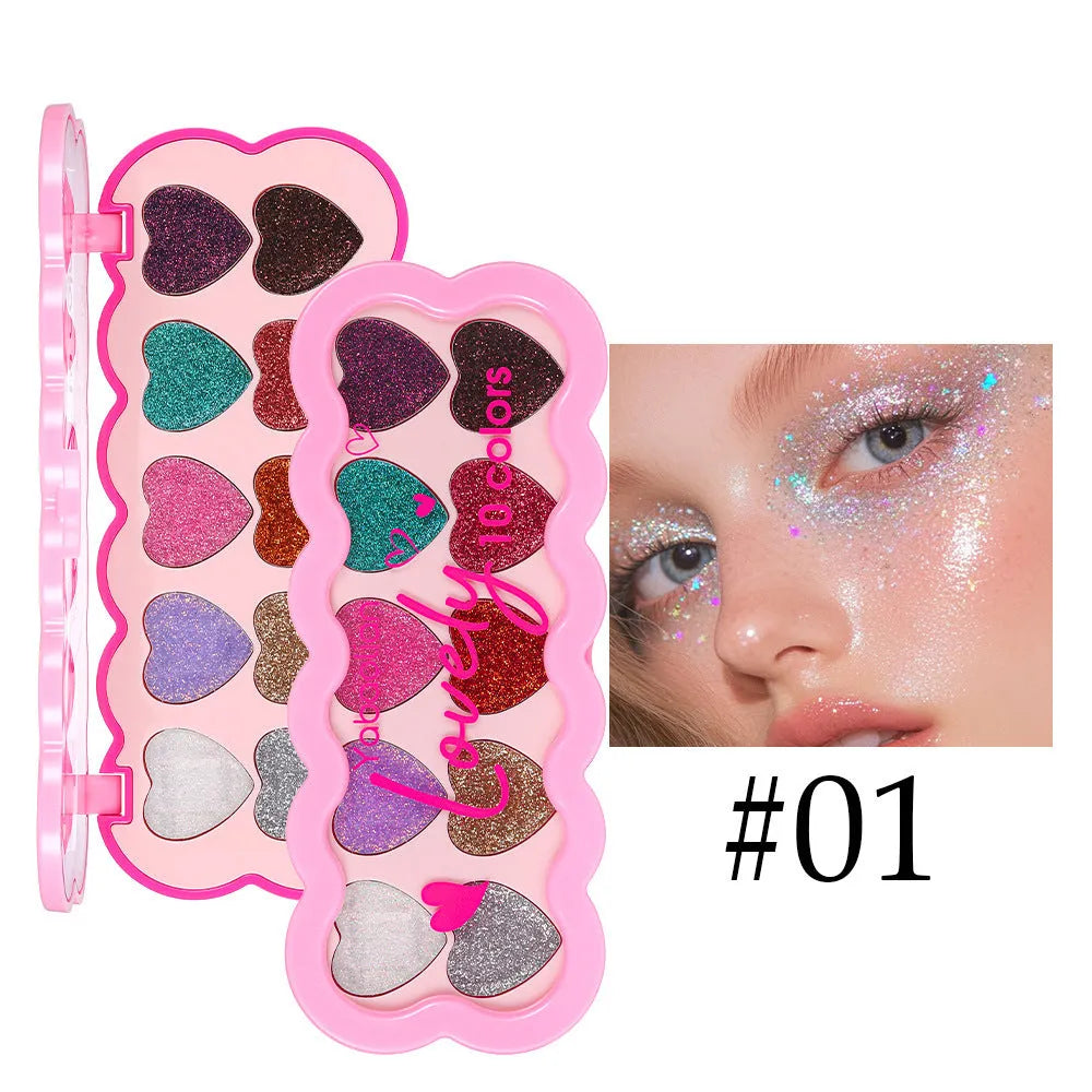 Pearlescent Heart ten-color sequins eye shadow palette showing shades of white, beige, pink, purple, brown, blue, black, royal blue, maroon, and coral.