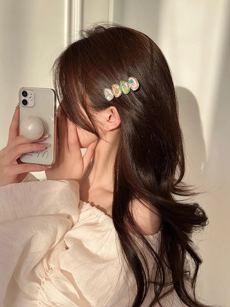 Forest Fairy side bangs hair clip for women in pink plastic and resin with Korean-style lines