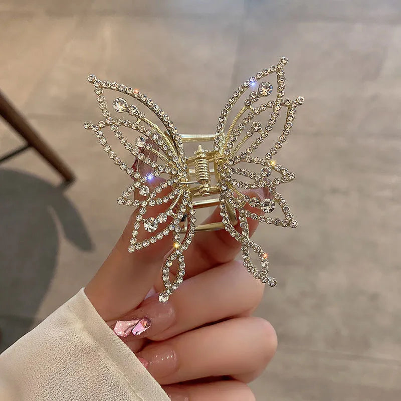 Butterfly design hair barrette for women with alloy construction and decorative rhinestone or pearl styling