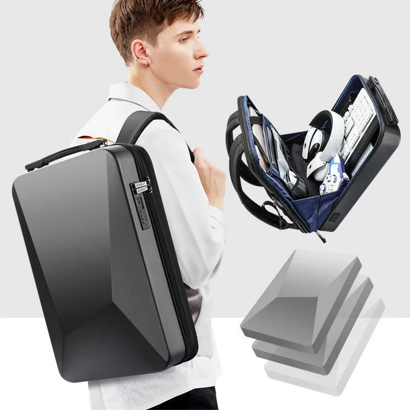Large PC hard shell gaming backpack in titanium gold silver colour with double shoulder straps and organisational pockets