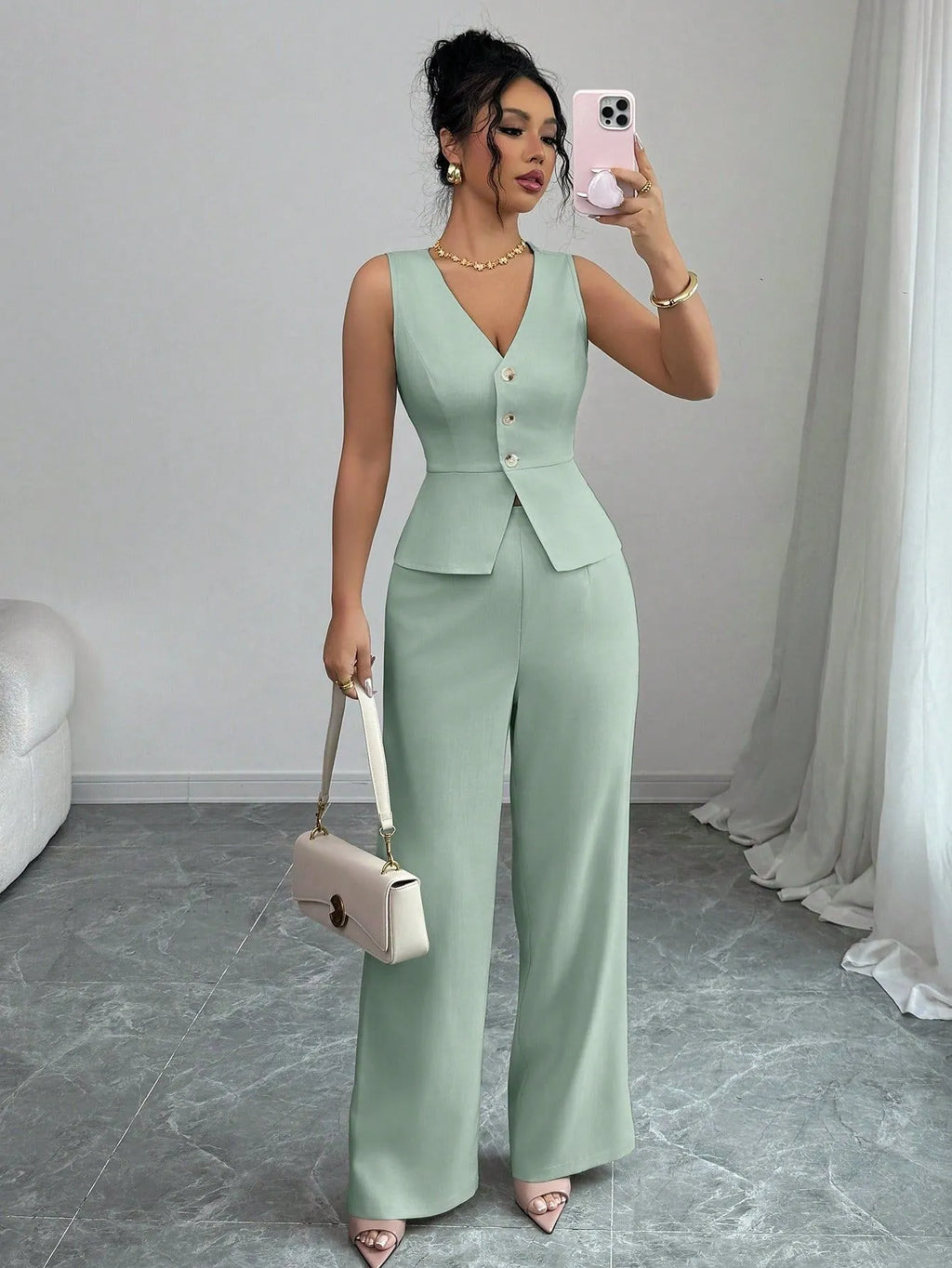 Women's solid colour two-piece set with sleeveless vest and high-waist trousers in casual styling