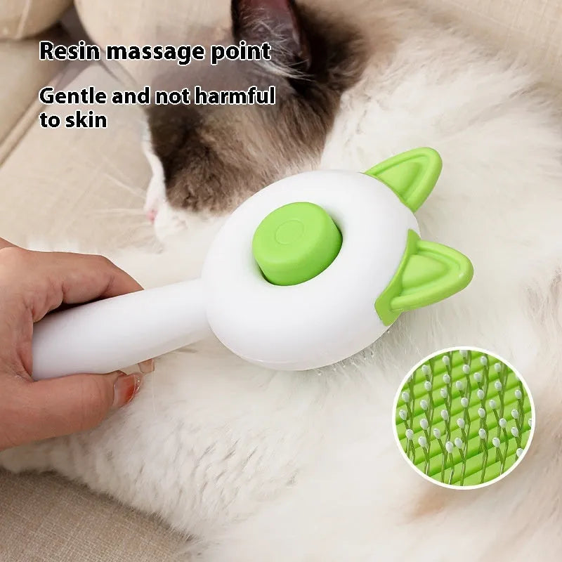 Self-cleaning cat grooming comb in greenish white and orange white colour options